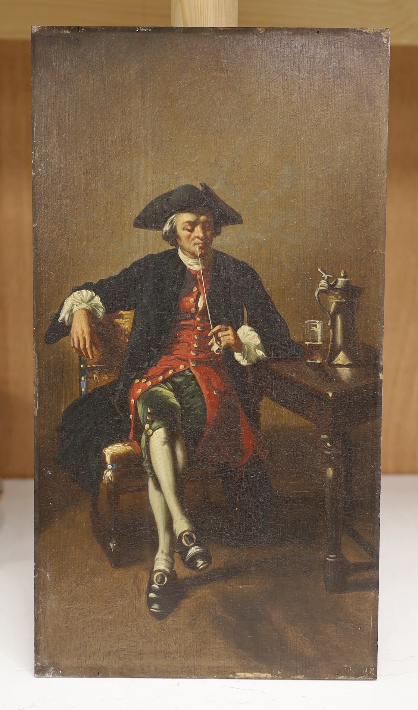 19th century English School, oil on wooden panel, 18th century gentleman seated at a tavern table, 41 x 22cm, gilt gesso frame.